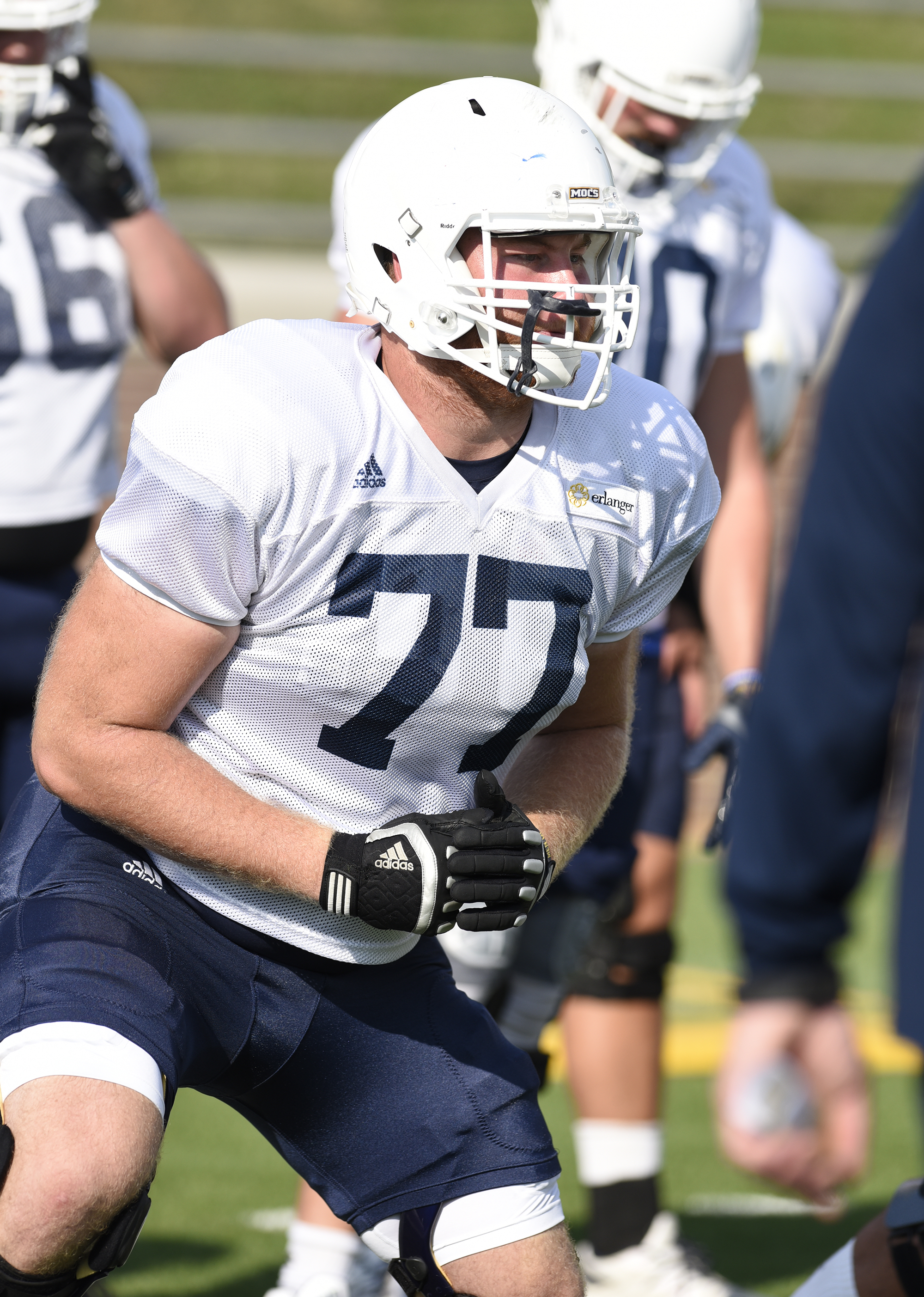 Taylor Helton (77) plays on the offensive line. The UTC football team practiced at Finley Stadium on August 10, 2017.