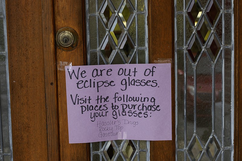 A sign on the door of the Audrey Pack Memorial Library indicates that they have given out all of their eclipse glasses on Friday, Aug. 11, 2017, in Spring City, Tenn. The library gave away hundreds of free glasses to residents. On August 21, thousands are expected to flock to the small Rhea County town, which is home to about 2000 residents, to view the solar eclipse.