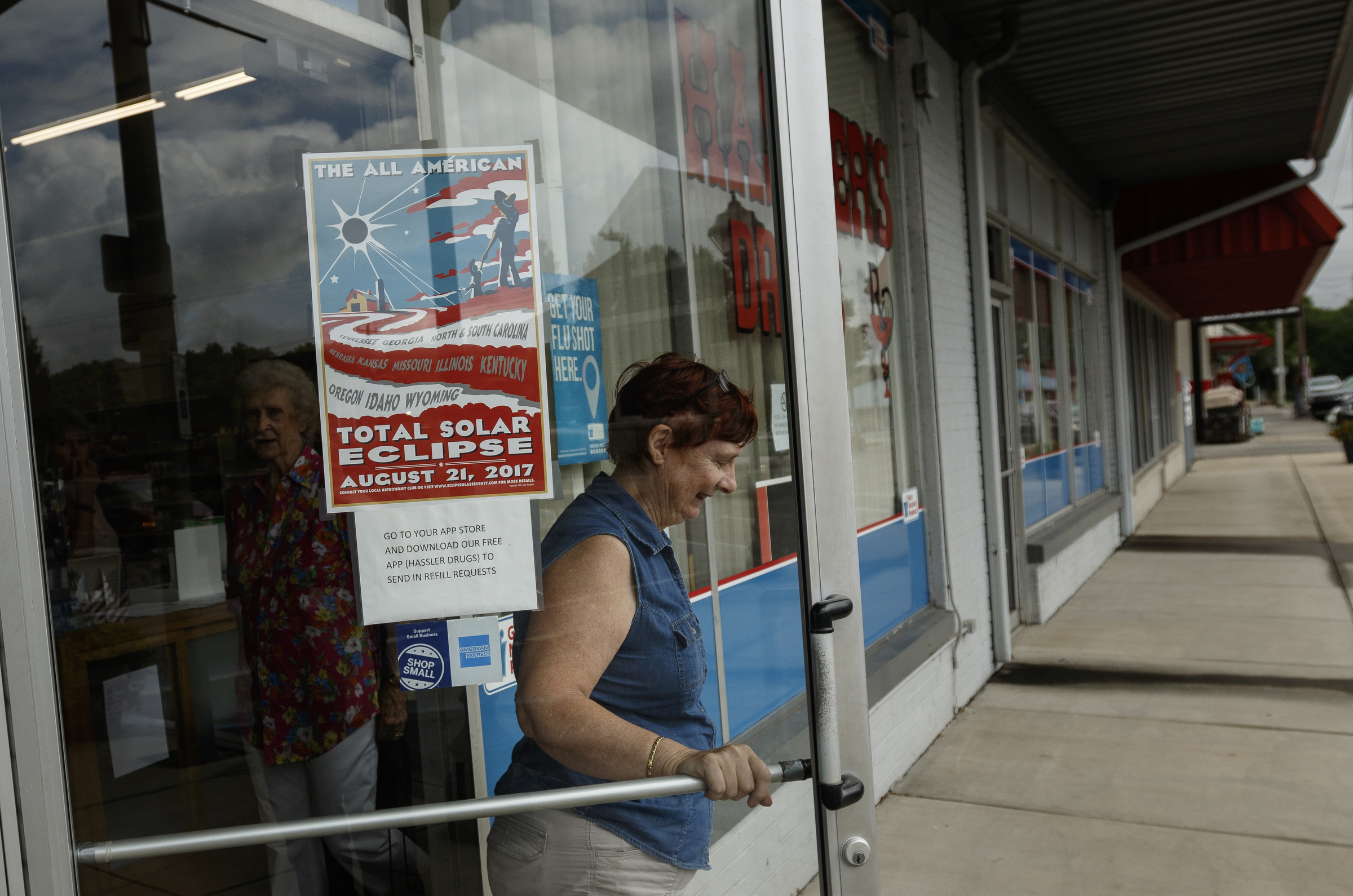 Ilaeka Villa, who owns the nearby Grandview Mountain Cottages and Glamor Camping venue, leaves Hassler's Drugs on Friday, Aug. 11, 2017, in Spring City, Tenn. Villa said that the cottages on their property were fully booked more than a year and a half ago for the upcoming solar eclipse. On August 21, thousands are expected to flock to the small Rhea County town, which is home to about 2000 residents, to view the solar eclipse.