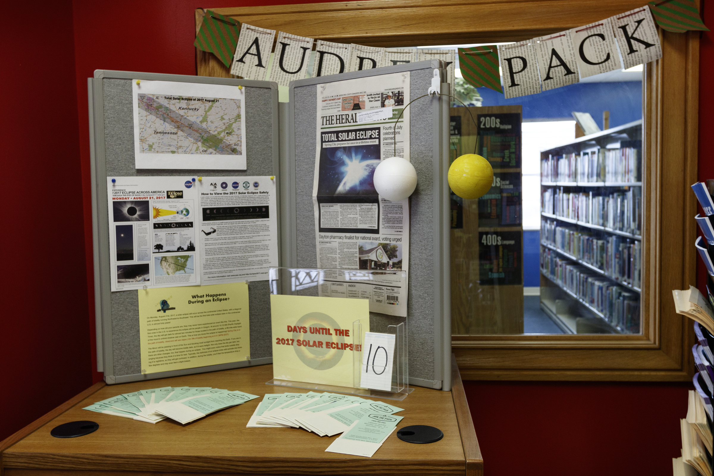An eclipse informational display in seen inside the lobby of the Audrey Pack Memorial Library on Friday, Aug. 11, 2017, in Spring City, Tenn. On August 21, thousands are expected to flock to the small Rhea County town, which is home to about 2000 residents, to view the solar eclipse.