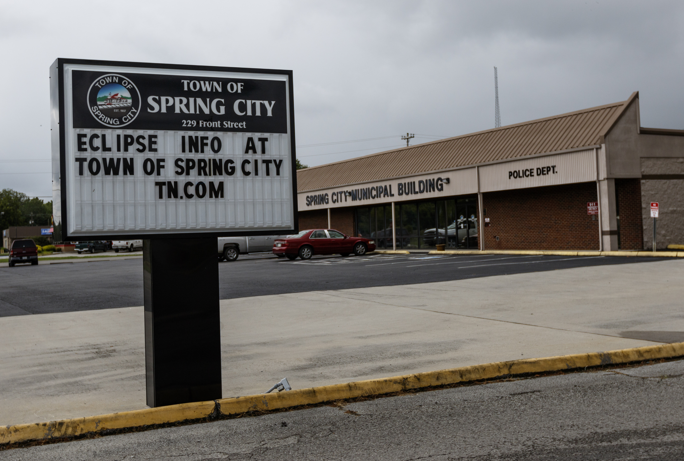 A sign outside of the Spring City Municipal Building indicates where information on the upcoming eclipse events can be found on Friday, Aug. 11, 2017, in Spring City, Tenn. On August 21, thousands are expected to flock to the small Rhea County town, which is home to about 2000 residents, to view the solar eclipse.