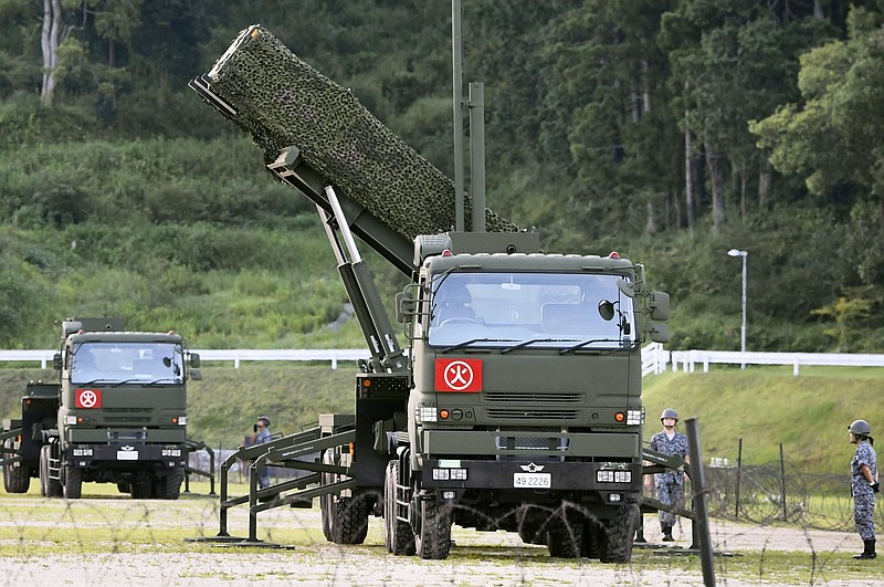 
              A PAC-3  interceptor is deployed in the compound of a garrison of the Japan Ground Self-Defense Force in Konan, Kochi prefecture, Japan, Saturday, Aug. 12, 2017. Japan started deploying land-based Patriot interceptors after North Korea threatened to send ballistic missiles flying over western Japan and landing near Guam. The Defense Ministry said Friday the PAC-3 surface-to-air interceptors are being deployed at four locations - Hiroshima, Kochi, Shimane and Ehime. (Ryosuke Ozawa/Kyodo News via AP)
            