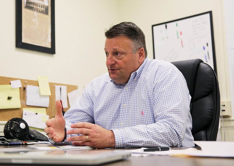 Allen Pratt, executive director of the National Rural Education Association, speaks about schools in rural areas Friday, Aug. 11, 2017, in his office at the University of Tennessee at Chattanooga. The National Rural Education Association has moved it's office to UTC and is now under the leadership of Pratt, a longtime Tennessee educator.