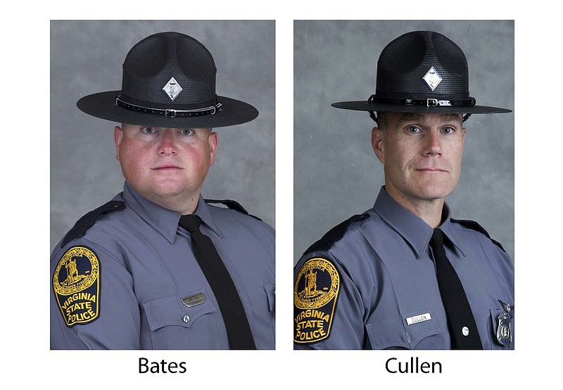 These undated photo provided by the Virginia State Police show Trooper-Pilot Berke M.M. Bates, left, of Quinton, Va., and Lt. H. Jay Cullen, of Midlothian, Va. The two were killed Saturday, Aug. 12, 2017, when the helicopter they were piloting crashed while assisting public safety resources during clashes at a nationalist rally in Charlottesville, Va. (Virginia State Police via AP)

