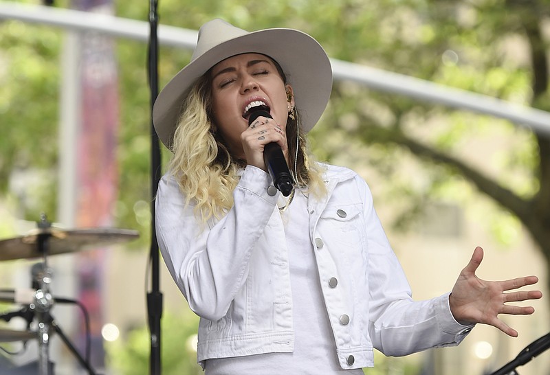 
              FILE - In this May 26, 2017 file photo, singer Miley Cyrus performs on NBC's "Today" show in New York.  The Teen Choice 2017 awards on Sunday, Aug. 13 will honor Cyrus, Bruno Mars and other acts in a ceremony that will feature performances from French Montana, Rita Ora and other popular acts. (Photo by Evan Agostini/Invision/AP, File)
            