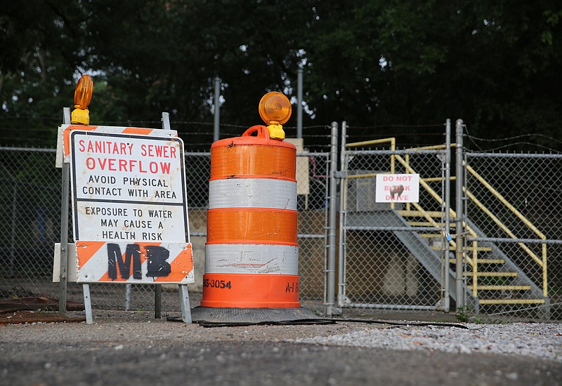 Signage surrounds the DuPont Pump Station indicating that no one should get near the overflow area Thursday, June 15, 2017, at the corner of Memphis Drive and Elm Street in Chattanooga, Tenn. The key objectives in the DuPont Pump Station overhaul are to prevent stormwater from getting into the sewage network in the first place and increasing the systemճ capacity. 