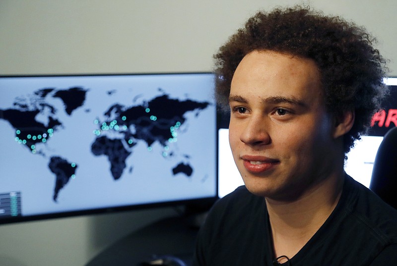 
              FILE - This Monday, May 15, 2017, file photo shows British IT expert Marcus Hutchins, branded a hero for slowing down the WannaCry global cyberattack, during an interview in Ilfracombe, England. Prosecutors have charged Hutchins and an unnamed co-defendant with conspiring to commit computer fraud in the state and elsewhere. Hutchins could enter a plea during a hearing Monday, Aug. 14, in Wisconsin federal court. (AP Photo/Frank Augstein, File)
            