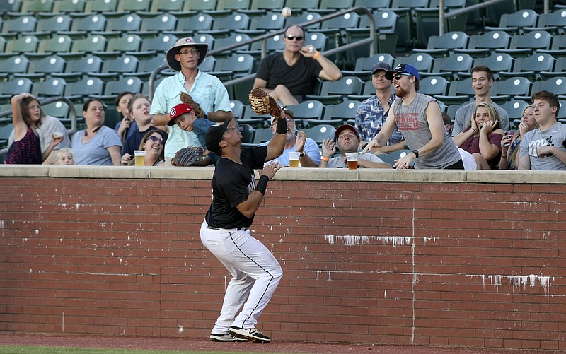 Lookouts first baseman Jonathan Rodriguez (30) catches a foul ball hit by Jacksonville designated hitter John Norwood (22) in a game last month at AT&T Field.