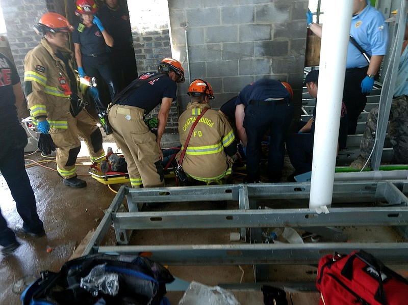 Chattanooga firefighters respond to a fall victim Tuesday afternoon at a construction site at the Edwin Hotel at 105 Walnut St. (Photo by Assistant Chief Danny Hague)