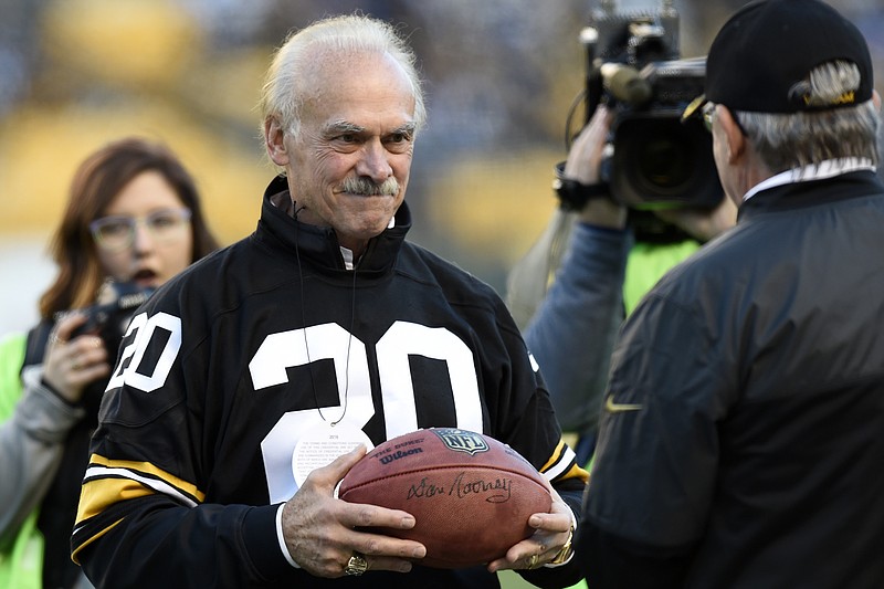 Veteran and former Pittsburgh Steelers Rocky Bleier takes part in pre game Salute to Service festivities before an NFL football game between the Pittsburgh Steelers and the Dallas Cowboys in Pittsburgh, Sunday, Nov. 13, 2016. (AP Photo/Don Wright)