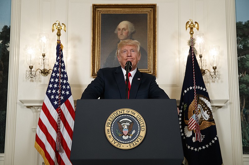 President Donald Trump pauses as he speaks about the deadly white nationalist rally in Charlottesville, Va., Monday, Aug. 14, 2017, in the Diplomatic Room of the White House in Washington. (AP Photo/Evan Vucci)
