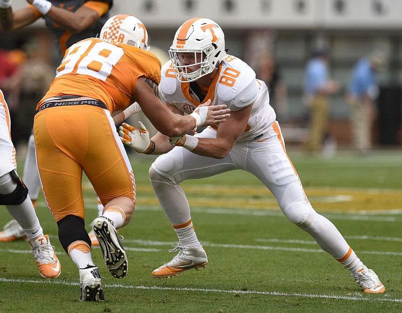 Tennessee redshirt sophomore Eli Wolf (80) went from walk-on tight end to scholarship player Tuesday, when coach Butch Jones awarded him a full ride.