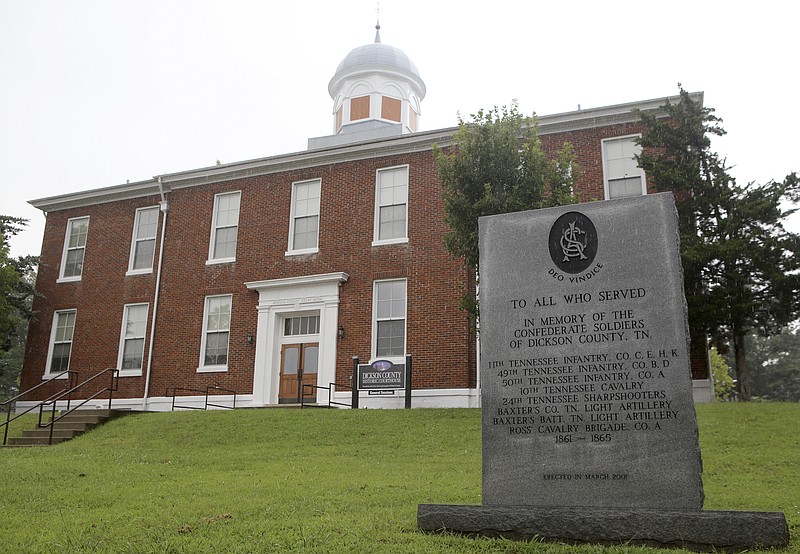 A monument "To All Who Served In Memory of the Confederate Soldiers of Dickson County" is seen in front of the Dickson County Historic Courthouse on Monday, Aug. 14, in Charlotte, Tenn.