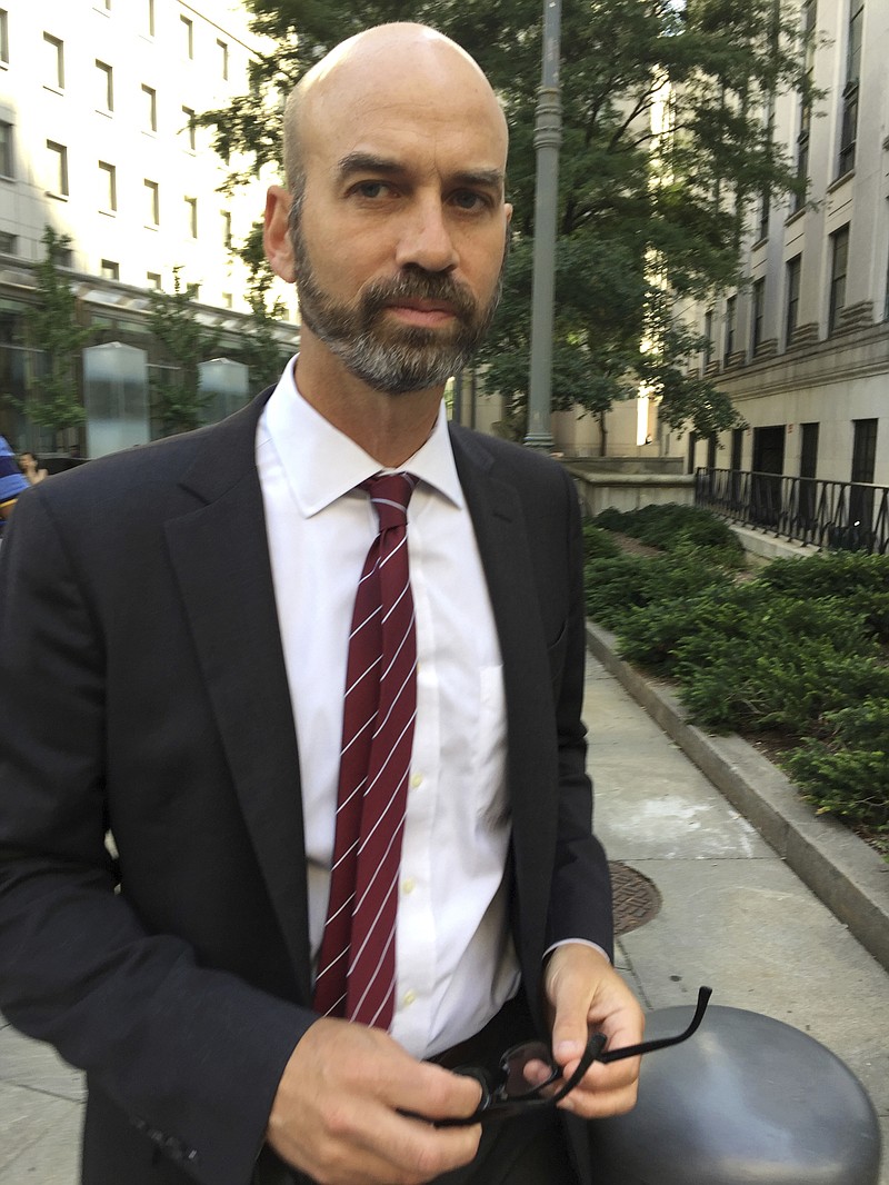 
              James Bennet, editorial page editor of The New York Times, leaves federal court on Wednesday, Aug. 16, 2017, in New York. Bennet was grilled in federal court by a lawyer for Sarah Palin, who's suing over an editorial that linked right-wing political rhetoric to the 2011 shooting of former U.S. Rep. Gabby Giffords. (AP Photo/Larry Neumeister)
            