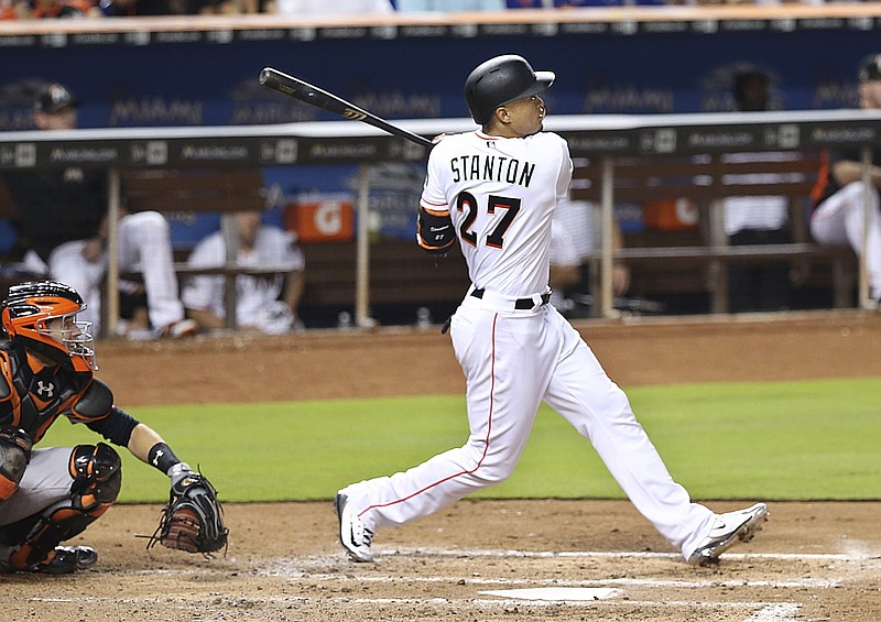 Miami Marlins Giancarlo Stanton hits a home run in the first round