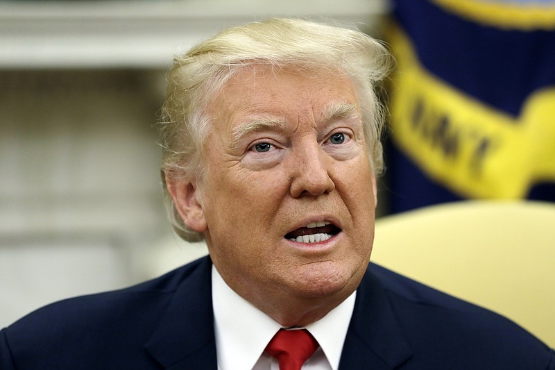 
              FILE - In this July 31, 2017, file photo, U.S. President Donald Trump speaks in the Oval Office in Washington. Of all the trade deals he lambasted on the campaign trail as threats to American workers, Trump reserved particular scorn for one: The North American Free Trade Agreement. Five days of talks aimed at overhauling NAFTA begin Wednesday, Aug. 16, 2017, in Washington, with negotiations to follow in Mexico and Canada. (AP Photo/Evan Vucci, File)
            