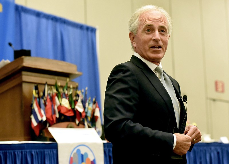 
              U.S. Sen. Bob Corker, R-Tenn., takes questions from attendees at the Rotary Club of Chattanooga, Thursday, Aug. 17, 2017, at the Chattanooga, Tenn., Convention Center. Corker delivered a blistering rebuke of President Donald Trump, saying he’s not yet demonstrated the stability or competence that’s required for an American president to succeed. (Tim Barber/Chattanooga Times Free Press via AP)
            
