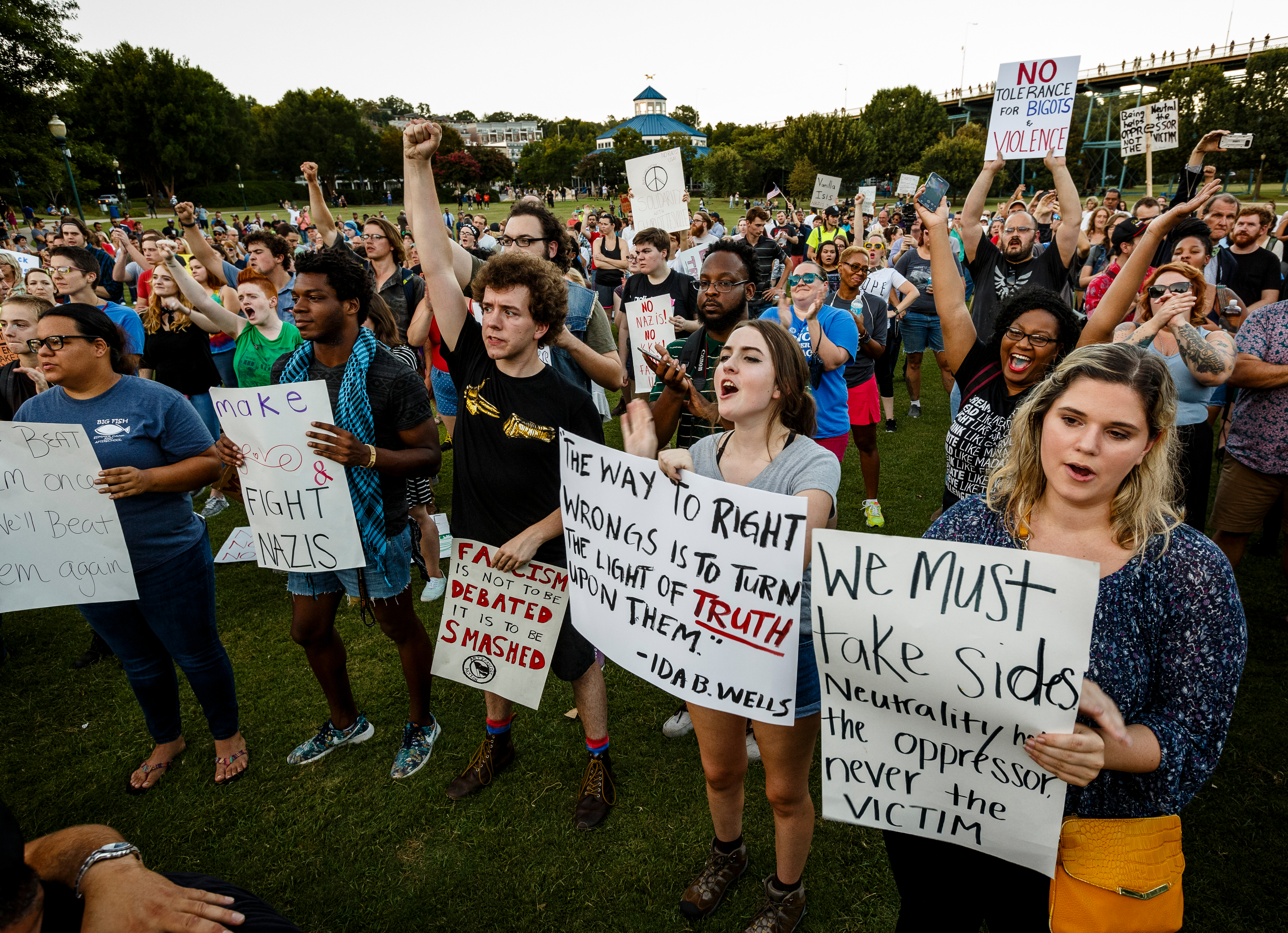 Demonstrators shout during a "Declaration of Resistance" rally in Coolidge Park on Thursday, Aug. 17, 2017, in Chattanooga, Tenn. Organizers said that the purpose of the demonstration, held in response to violence at the "Unite the Right" rally in Charlottesville, Va., was to declare resistance against Nazism.