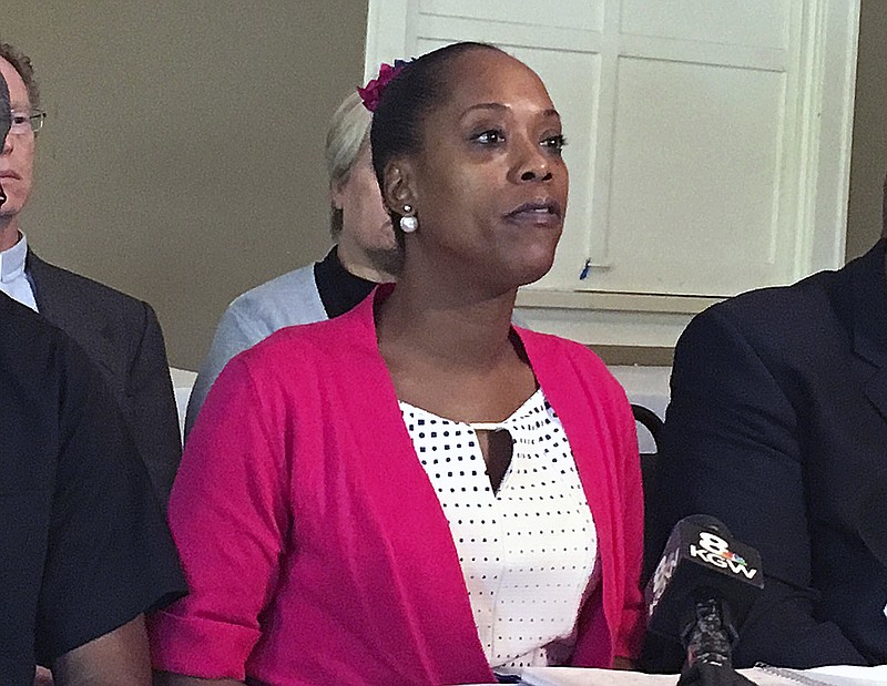 
              Demetria Hester speaks during a press conference in Portland, Ore., Friday, Aug. 18, 2017. Hester says Portland police could have prevented fatal stabbings aboard a light-rail train if they had taken her earlier complaint against Jeremy Christian more seriously. (AP Photo/Steven DuBois)
            