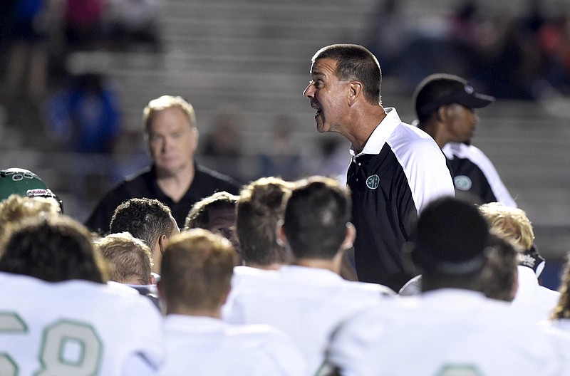 East Hamilton coach Ted Gatewood fires his team up for a game.