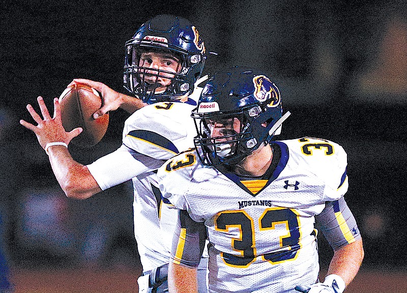 Walker Valley quarterback Kolten Gibson drops back to pass.