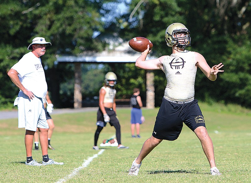 Calhoun quarterback Gavin Gray passes during a 7-on-7 session in July.