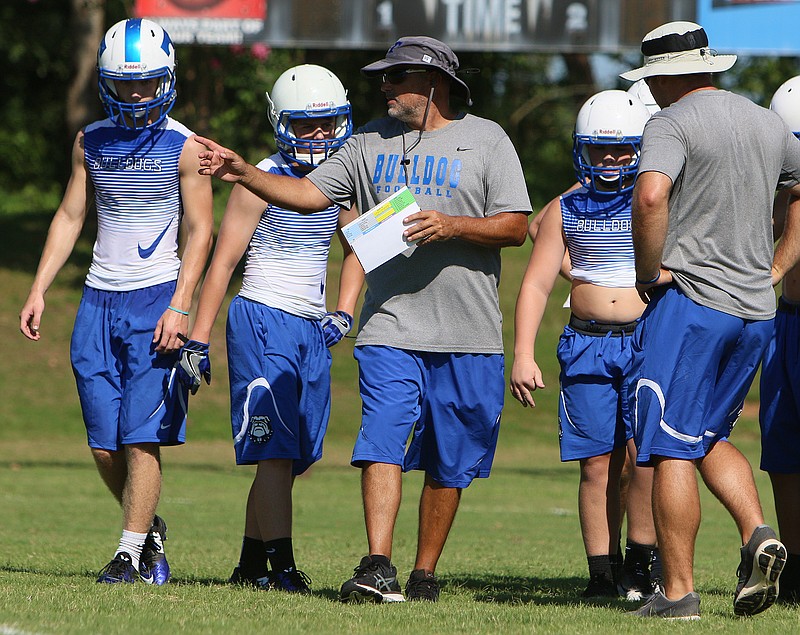 Trion coach Justin Brown instructs players during 7-on-7 competition.