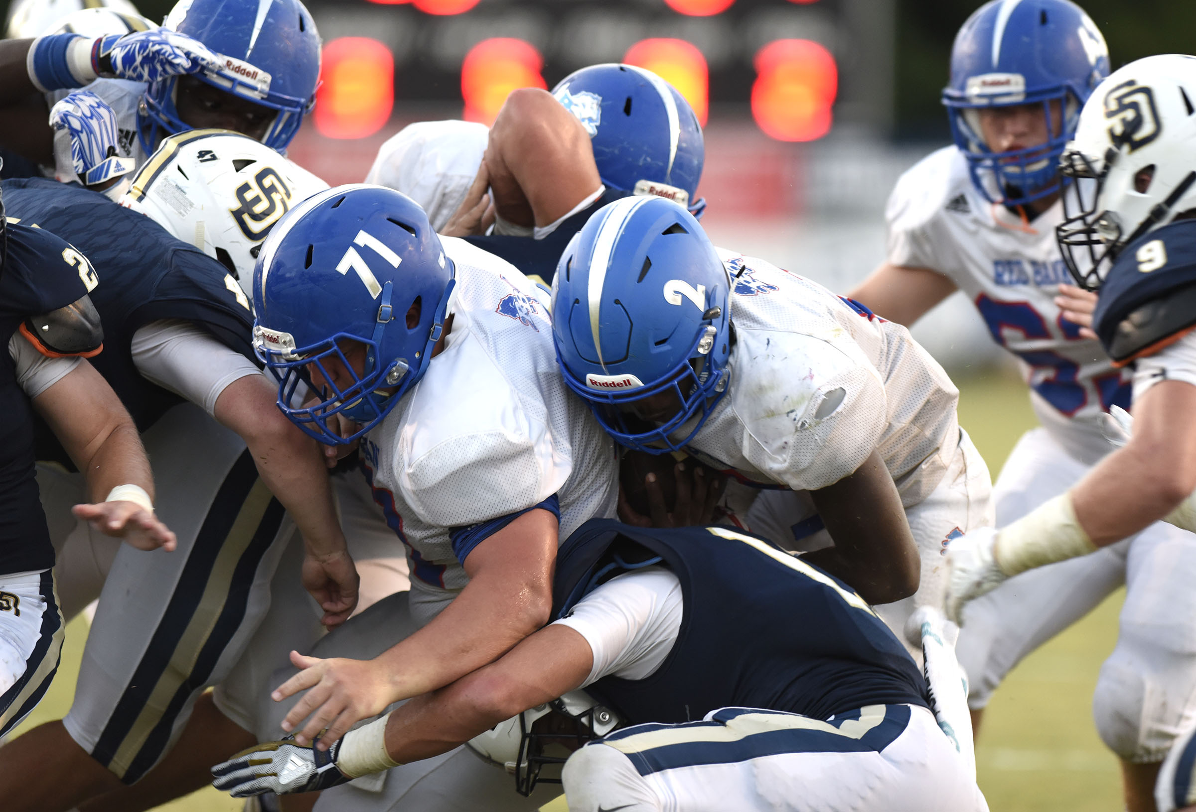 Red Bank's Zay Brown (2) follows the blocking of Cole Stevens (71) into the endzone for a Lion touchdown. The Red Bank Lions visited the Soddy-Daisy Trojans in TSSAA football action at Soddy-Daisy High School on August 18, 2017.