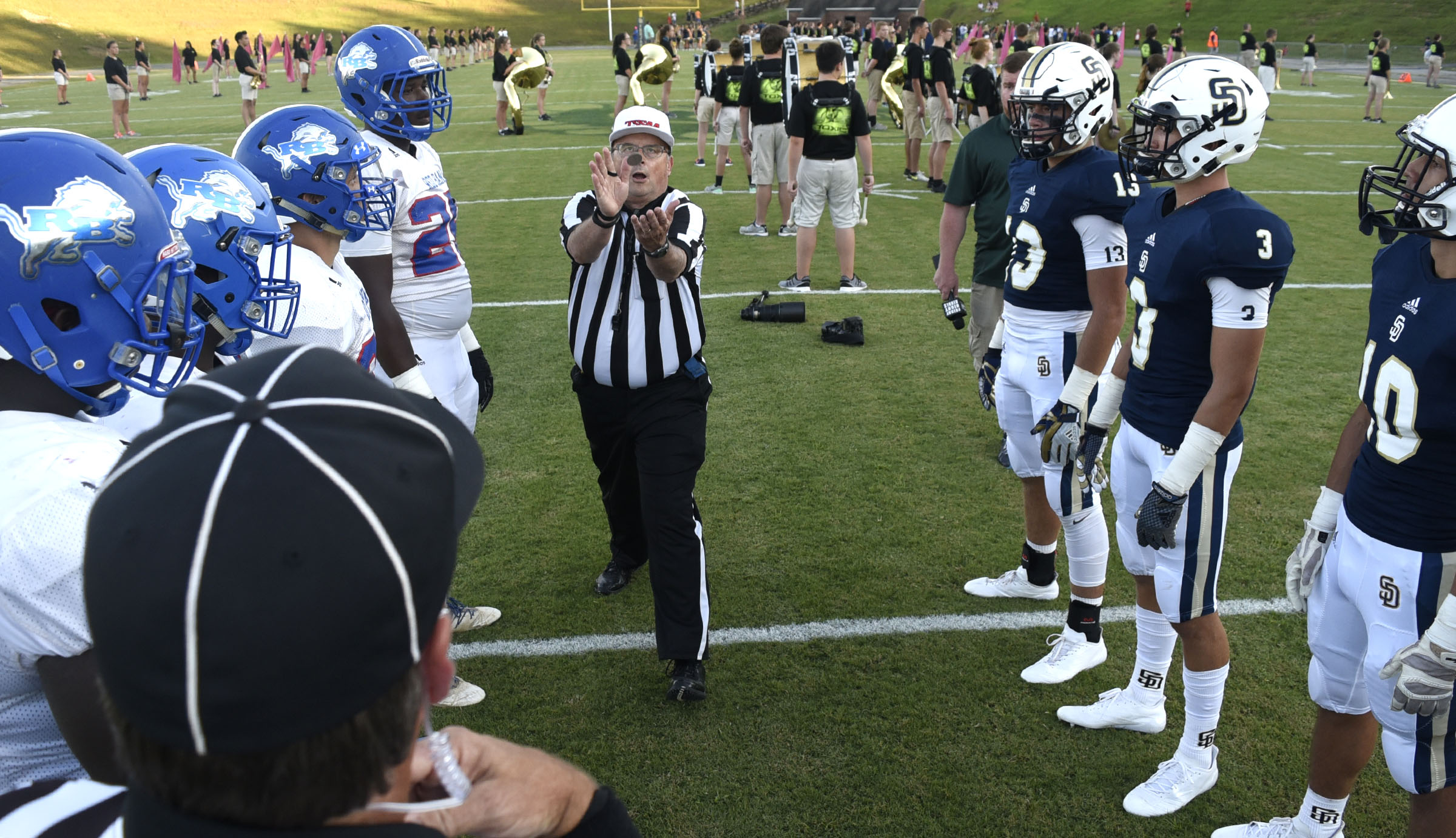 The referee catches the coin at the meeting of the captains at midfield. The Red Bank Lions visited the Soddy-Daisy Trojans in TSSAA football action at Soddy-Daisy High School on August 18, 2017.