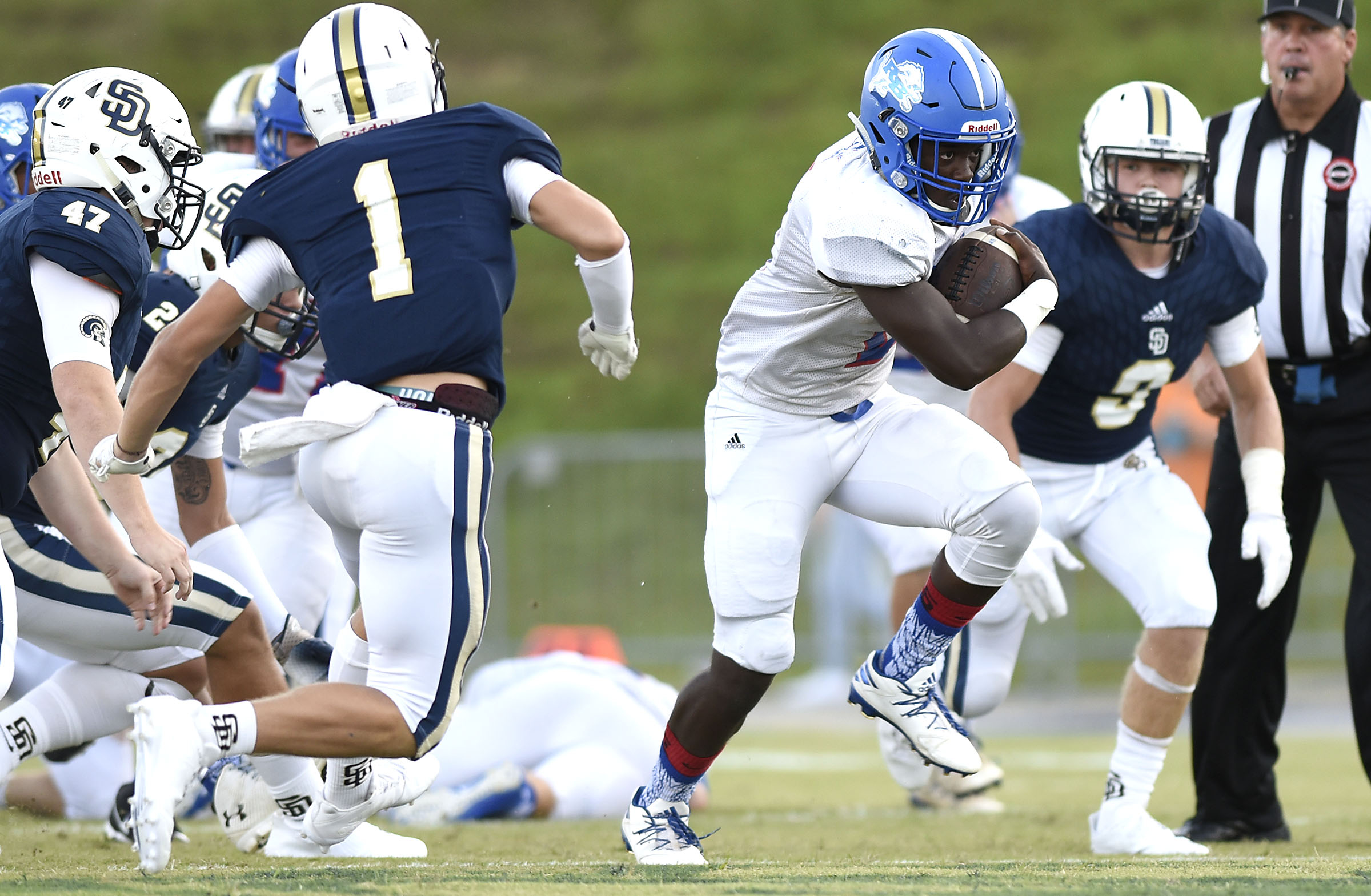 Red Bank's Zay Brown (2) breaks through the Trojan defense. The Red Bank Lions visited the Soddy-Daisy Trojans in TSSAA football action at Soddy-Daisy High School on August 18, 2017.