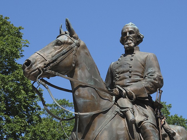 
              A statue of Confederate general Nathan Bedford Forrest sits in a park on Aug. 18, 2017 in Memphis, Tenn.  Rally organizer and student doctor Bryan Goodman says the statue of Forrest, an early leader of the Ku Klux Klan, represents hate and pain. The monument has been the subject of protests since a white supremacist rally in Charlottesville, Virginia, turned violent last weekend. (AP Photo/Adrian Sainz)
            