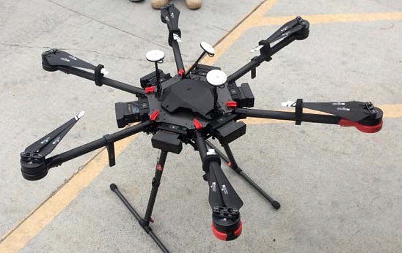 
              This undated photo provided by the U.S. Border Patrol shows a 2-foot-high drone that a border patrol agent spotted swooping over the border fence on Tuesday, Aug. 8, 2017, near a San Diego border crossing. Authorities have arrested a man they say used the drone to fly drugs across the Mexican border into California. (U.S. Border Patrol via AP)
            