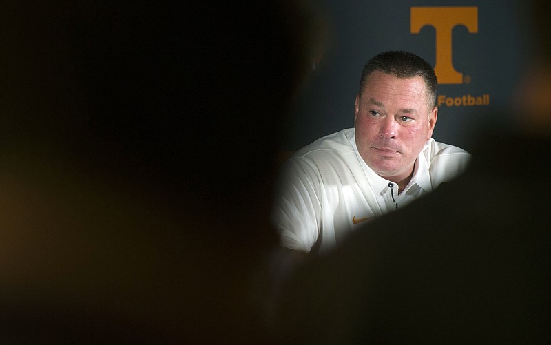 Tennessee football coach Butch Jones keeps looking forward in "a society of negativity."