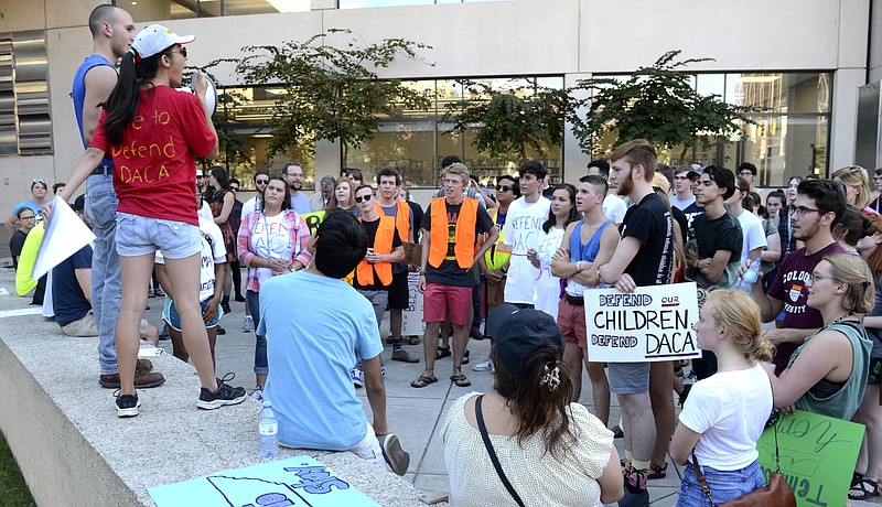 A group of over 100 people receive instructions from Alondra Gomez and Jared Steiman in front of the Chattanooga Public Library before beginning their march.  The Tennessee Immigrant and Refugee Rights Coalition held a march in support of the Deferred Action for Childhood Arrivals Program in Downtown Chattanooga on August 19, 2017.  