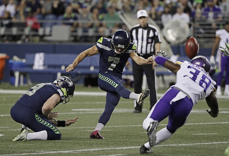 
              Seattle Seahawks' Blair Walsh (7) kicks a field goal as Minnesota Vikings' Horace Richardson (38) attempts to block during the second half of an NFL football preseason game, Friday, Aug. 18, 2017, in Seattle. (AP Photo/Stephen Brashear)
            