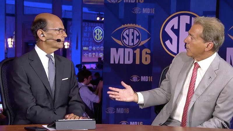 Paul Finebaum of the SEC Network and Alabama football coach Nick Saban argue during last year's SEC media days in Hoover, Ala.