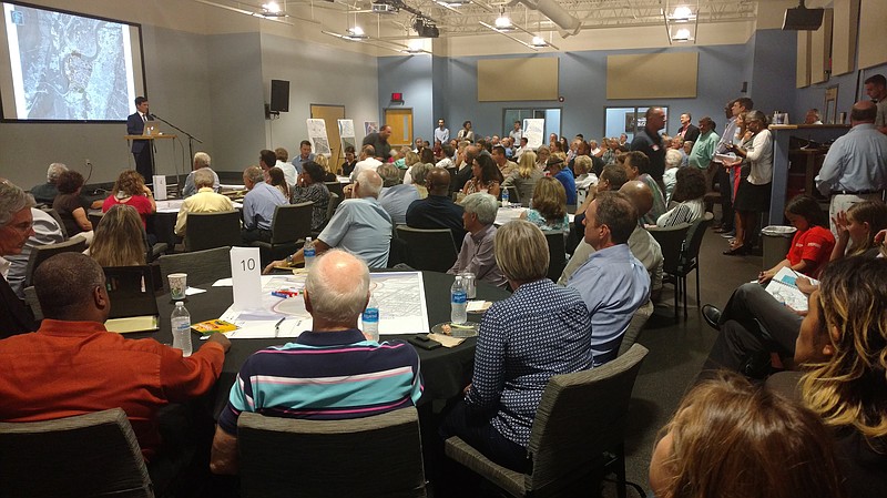 At the Calvary Chapel, more than 150 people take part in one of two meetings last week for the South Broad district. A new Lookouts stadium is one of many ideas under study by planners.