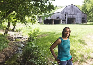 Fawn Weaver on the farm she bought where Nearest Green and Jack Daniel first distilled whiskey together in the late 1880s, in Lynchburg, Tenn., June 21, 2017. Weaver, a real estate investor and author, is on a mission to ensure that Green, a former slave who taught Daniel how to make whiskey, is properly recognized. (Nathan Morgan/The New York Times)