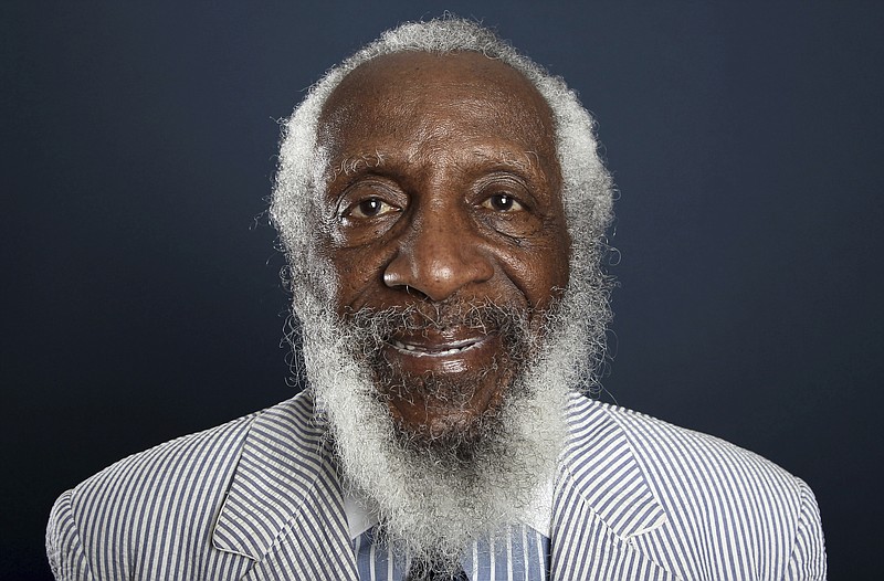In this July 21, 2012 file photo, comedian and activist Dick Gregory poses for a portrait during the PBS TCA Press Tour in Beverly Hills, Calif. Gregory, the comedian and activist and who broke racial barriers in the 1960s and used his humor to spread messages of social justice and nutritional health, has died. He was 84. Gregory died late Saturday, Aug. 19, 2017, in Washington, D.C. after being hospitalized for about a week, his son Christian Gregory told The Associated Press. He had suffered a severe bacterial infection. (Photo by Matt Sayles/Invision/AP, File)