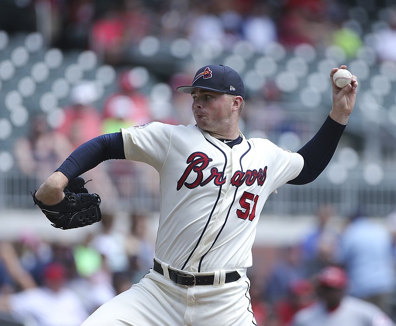 Atlanta Braves starting pitcher Sean Newcomb (51) works against Cincinnati Reds in the first inning of a baseball game, Sunday, Aug. 20, 2017, in Atlanta. (AP Photo/John Bazemore)