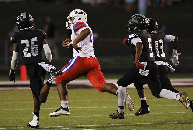 Northwest Whitfield's Dominique Sistrunk breaks ahead of Ridgeland's Stephon Walker (26), Markeith Montgomery (5), and Azavier Blackwell (13) on a long run during their prep football game at Ridgeland High School on Friday, Sept. 23, 2016, in Rossville, Ga.