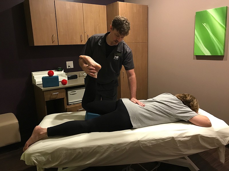 A Massage Envy customer receives a full body stretch. The new offering is administered by an employee who has received special training in helping to stretch every muscle group in the body. (Contributed photo)