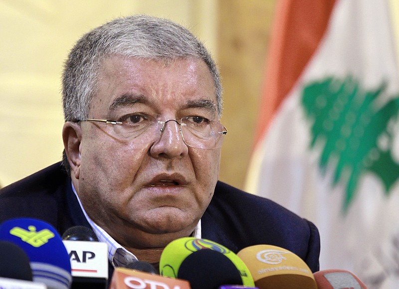 
              FILE -- In this Nov. 15, 2015, file photo, Lebanese Interior Minister Nohad Machnouk holds a press conference at the police headquarter in Beirut, Lebanon. Machnouk said Monday that the country's police intelligence played a major role in foiling a plot to bring down an Emirati passenger plane that was supposed to take off from Sydney in Australia to the United Arab Emirate capital of Abu Dhabi. (AP Photo/Bilal Hussein)
            