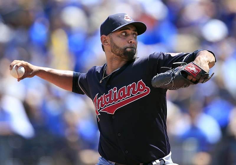 Cleveland Indians pitcher Andrew Miller throws to the Minnesota