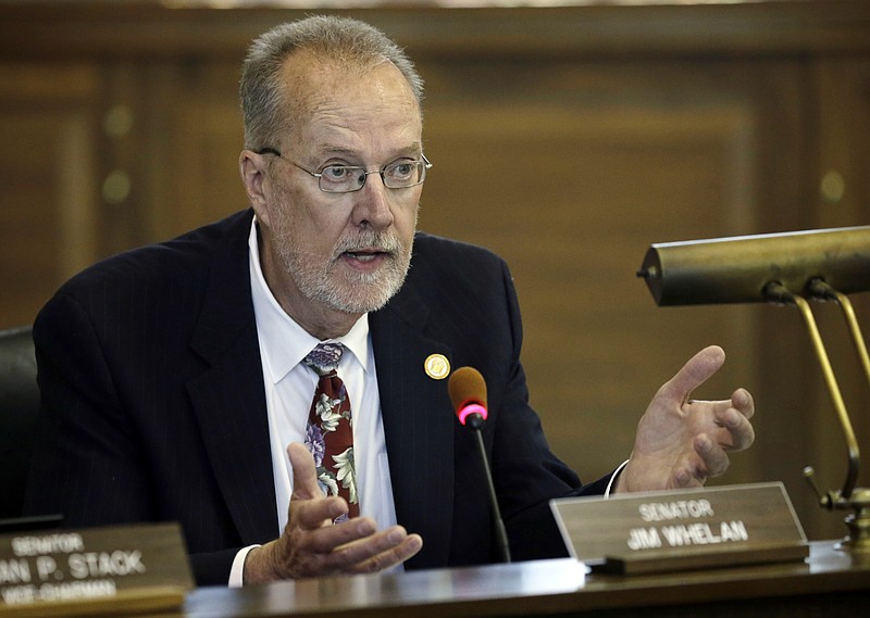 
              FILE- In this April 30, 2015 file photo, State Sen. Jim Whelan, D-Northfield, N.J., asks Harvey Kesselman, acting president of Stockton University, a question as he sits in on the New Jersey Senate Budget and Appropriations Committee meeting at the Statehouse in Trenton, N.J. Whelan, a longtime mayor of Atlantic City and Democratic New Jersey state senator, has died. He was 68. Whelan’s death was announced on his Facebook page Tuesday night, Aug. 22, 2017. A cause of death was not disclosed.  (AP Photo/Mel Evans, File)
            