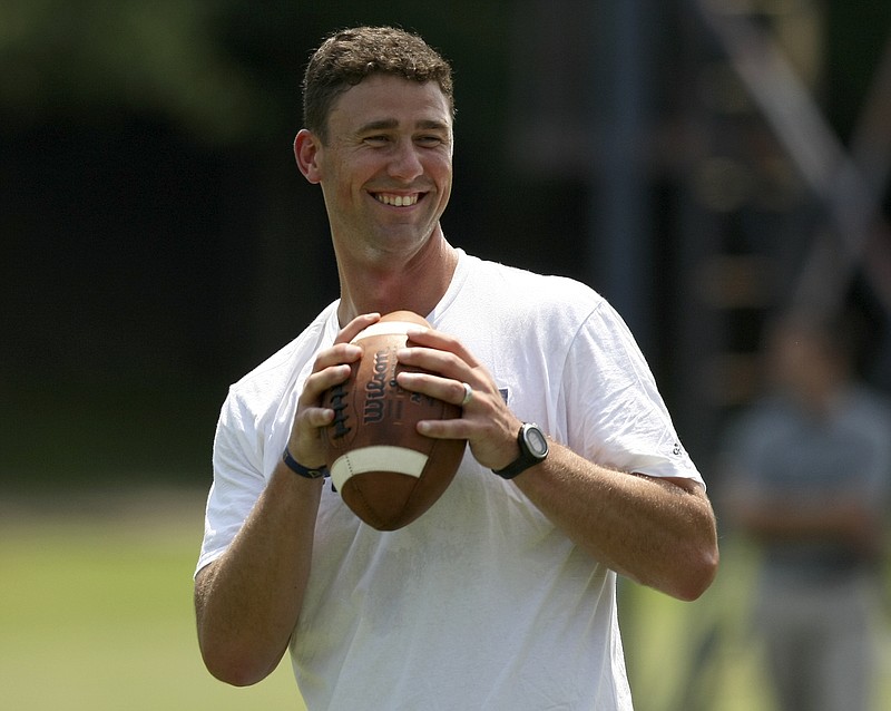 UTC head coach Tom Arth smiles during the first day of fall practice at Scrappy Moore Field on Monday, July 24, in Chattanooga, Tenn.