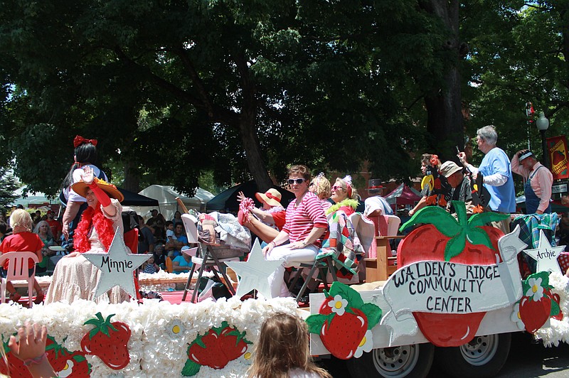 Linda Shaver, front center, sits with her HeeHaw gossip girls on the Walden's Ridge Community Center "Hollywood Starberry"-themed float at the 2014 annual Tennessee Strawberry Festival in Dayton.