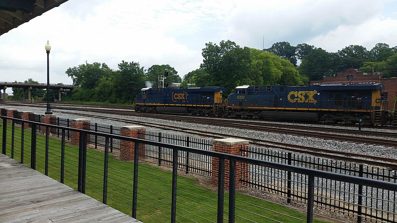 A train passes by the Southern Freight Depot in Dalton, Ga.
