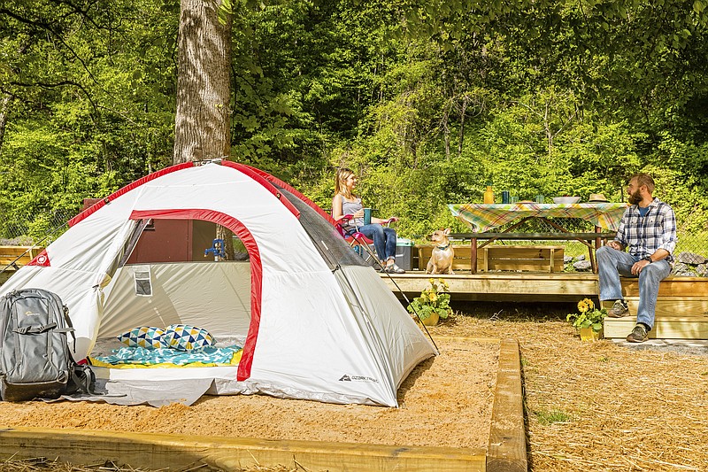 A Kampgrounds of America campsite in Cherokee, N.C., just outside Great Smoky Mountains National Park, comes with a private deck, picnic table, fire ring and charging station.