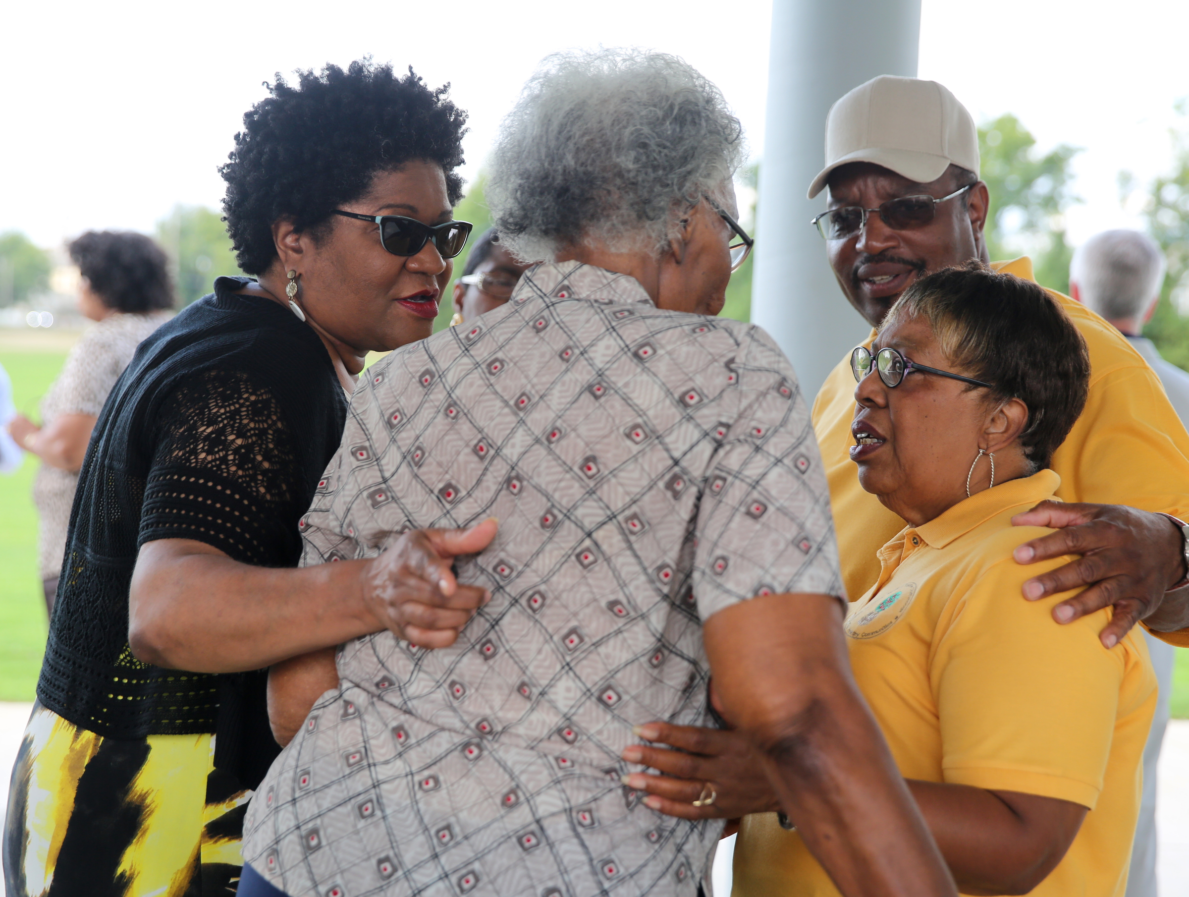 Chamber of Commerce member Maria Noel, resident Ruth Williams and South Chattanooga Leadership Advisory Council chairman Tony Haire speak with South Chattanooga Leadership Advisory Council vice chair Rosemary Porter Wednesday, Aug. 23, 2017, during the ribbon cutting ceremony for the Southside Community Park in Chattanooga, Tenn. Williams is the oldest resident of the community.